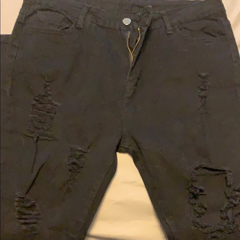 Black jeans with holes